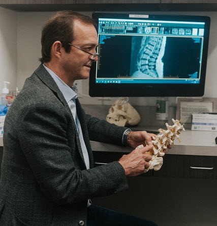 dr barnett neurosurgeon diagnosing spine conditions